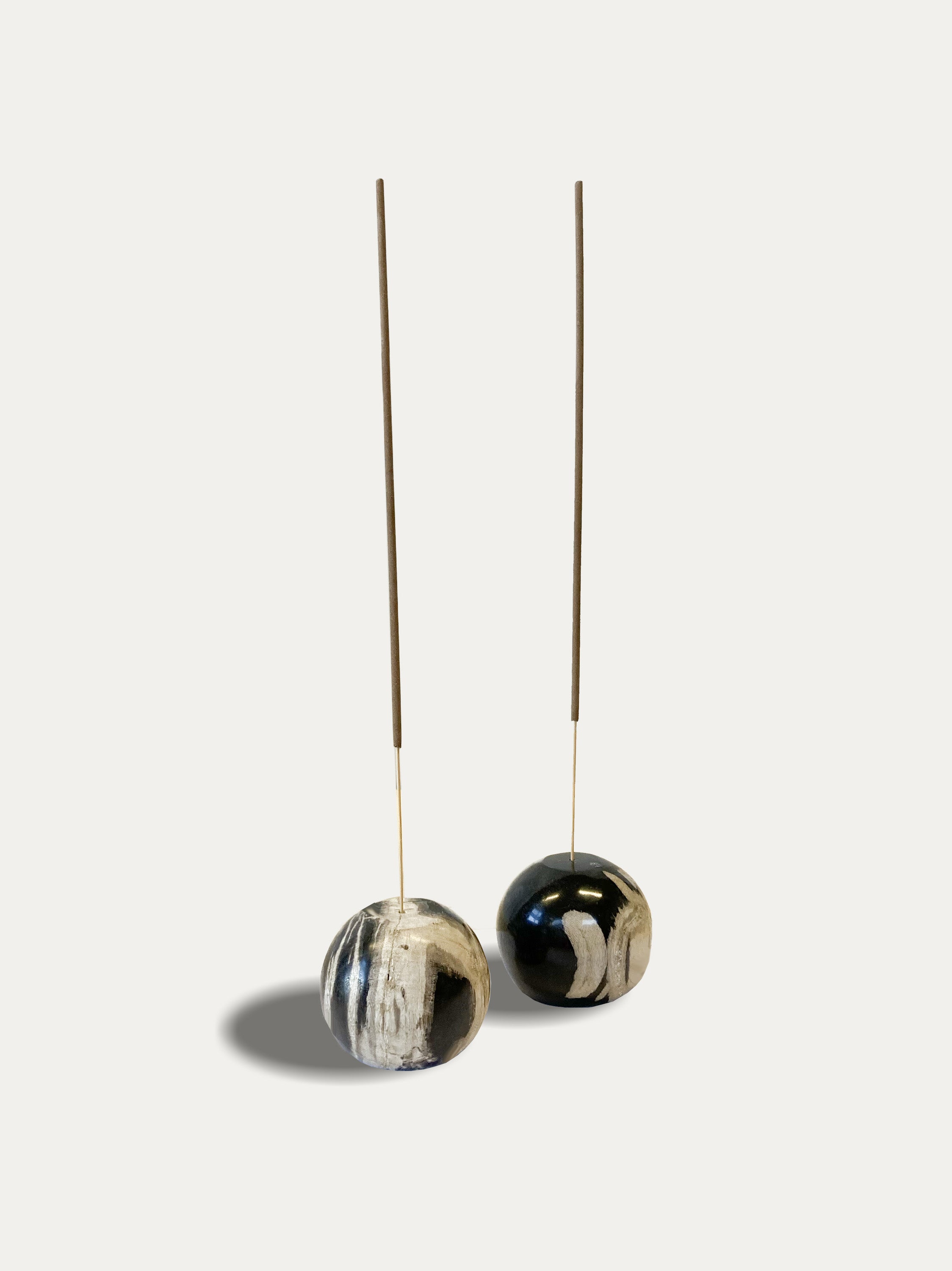 Set of 2 round reversible candle/incense holders in petrified wood and assorted balinese incense