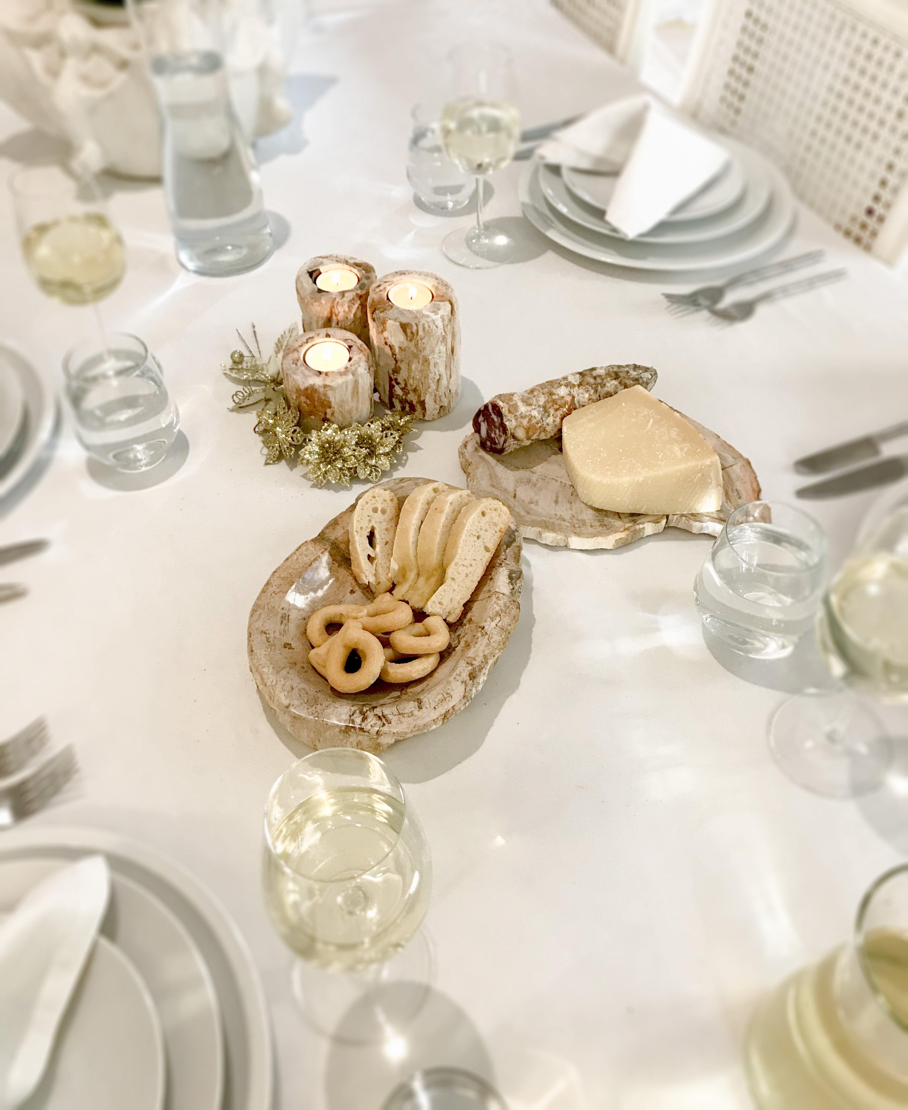 Set of 3 organic reversible candle holders in petrified wood