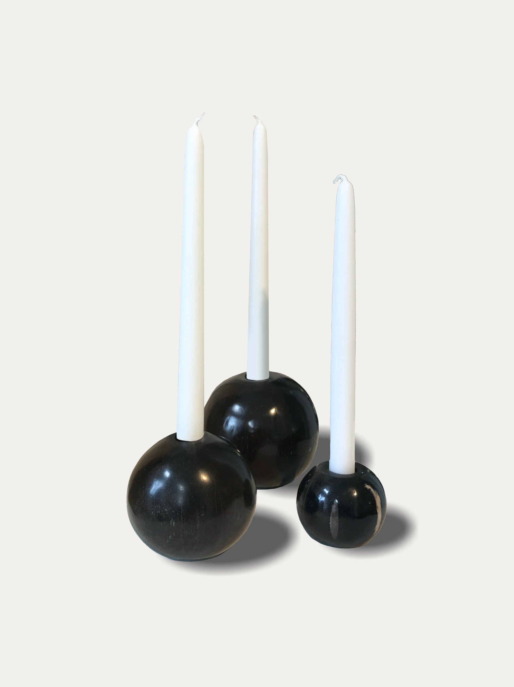 Set of 3 round reversible candle holders in petrified wood