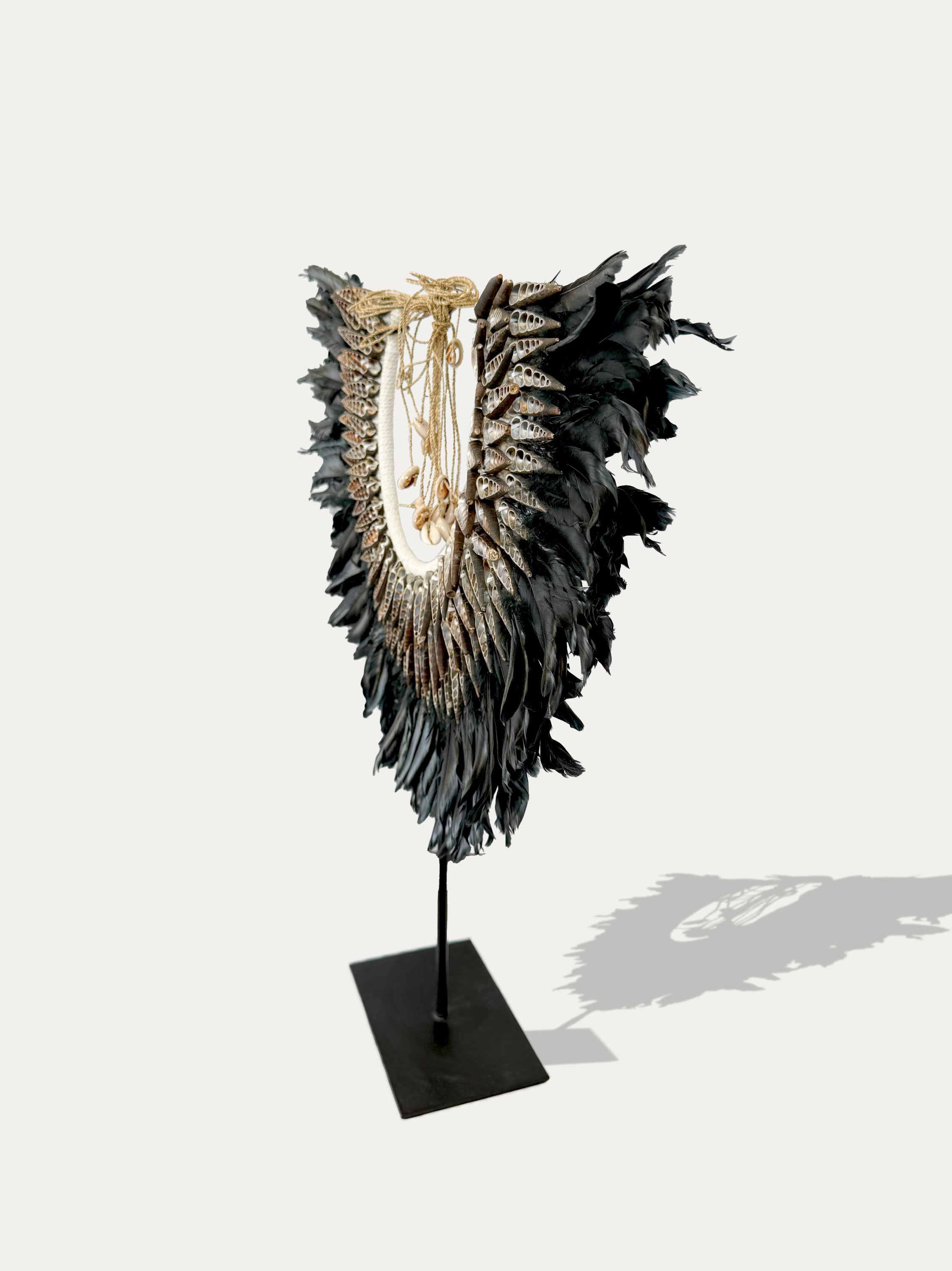 black_spiral_shell_feather_necklace_papua_handmade_luxury_kirschon_lake_como