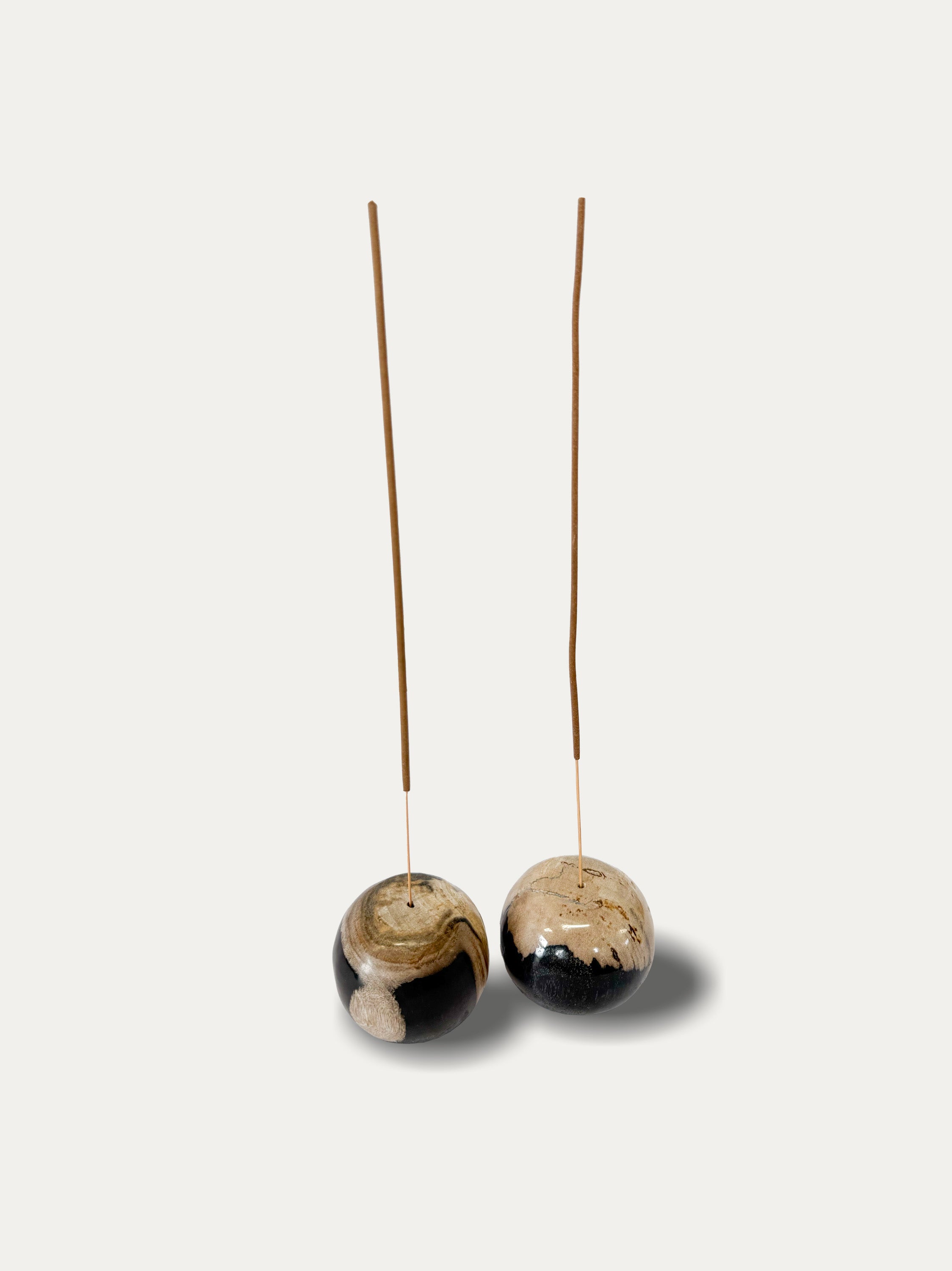 Set of 2 round reversible candle/incense holders in petrified wood and assorted balinese incense
