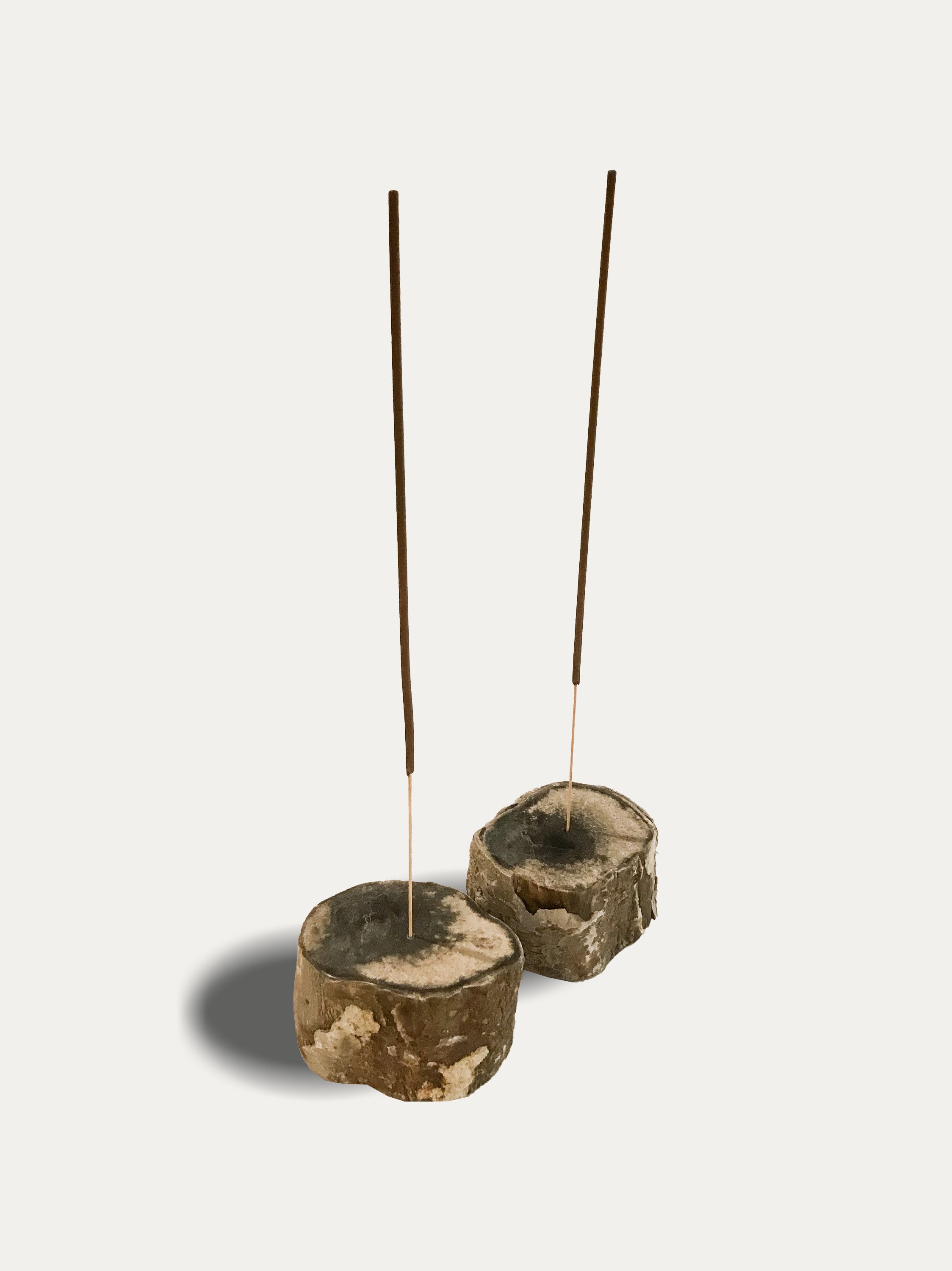 Set of 2 organic reversible candle/incense holders in petrified wood and assorted balinese incense