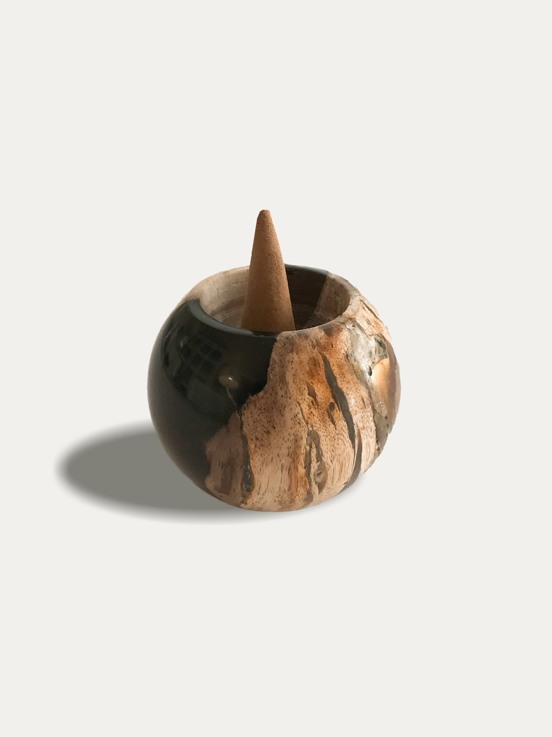 Round reversible candle/incense holder in petrified wood and assorted Balinese incense