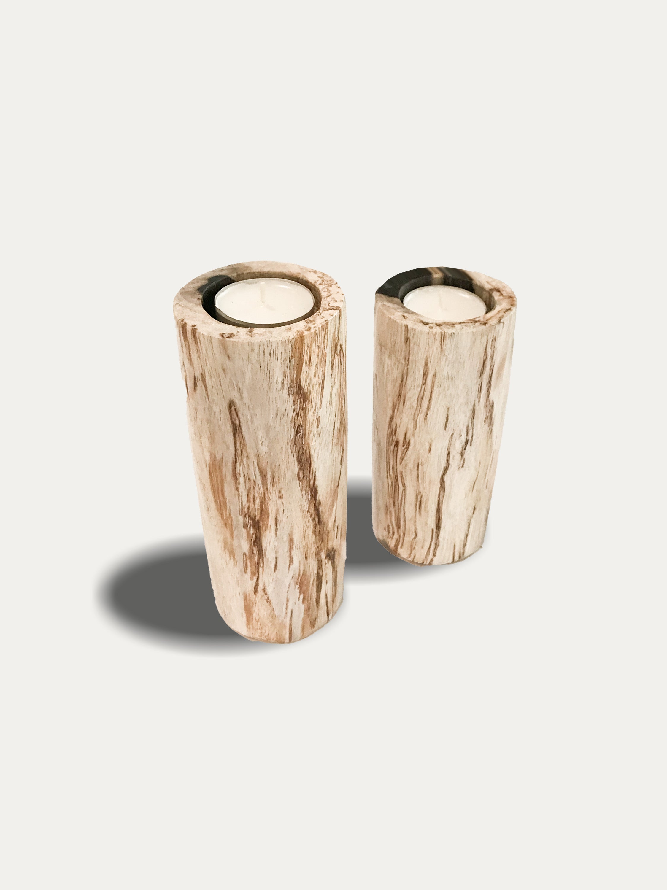 Set of 2 tall reversible candle holders in petrified wood