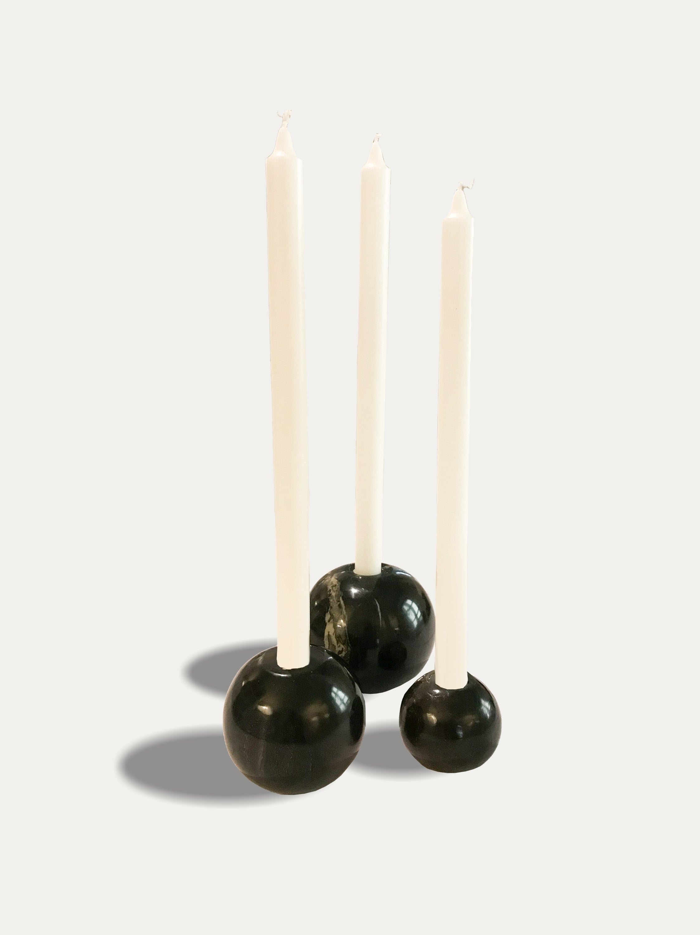 Set of 3 round reversible candle holders in petrified wood