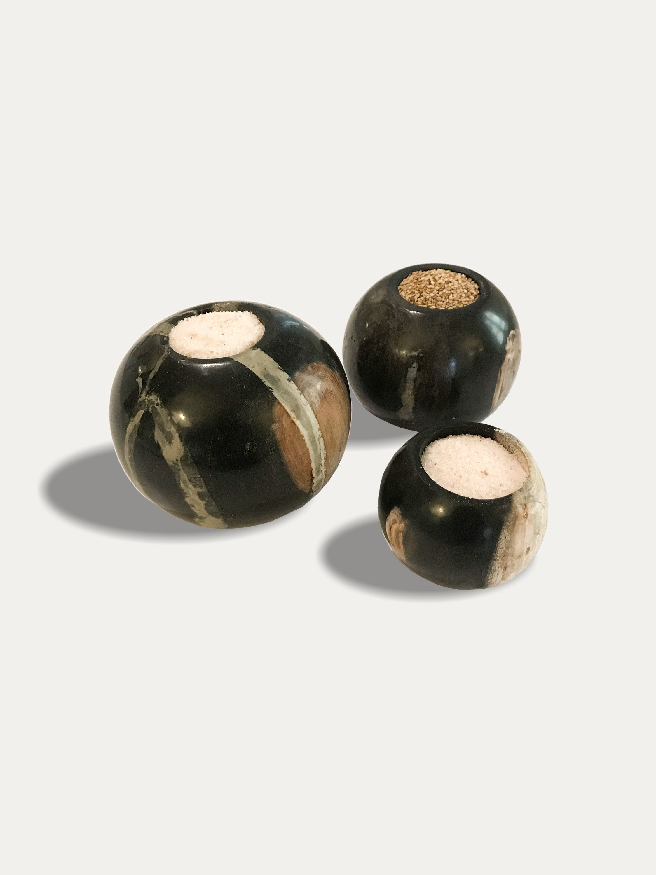 Set of 3 round reversible candle holders in petrified wood