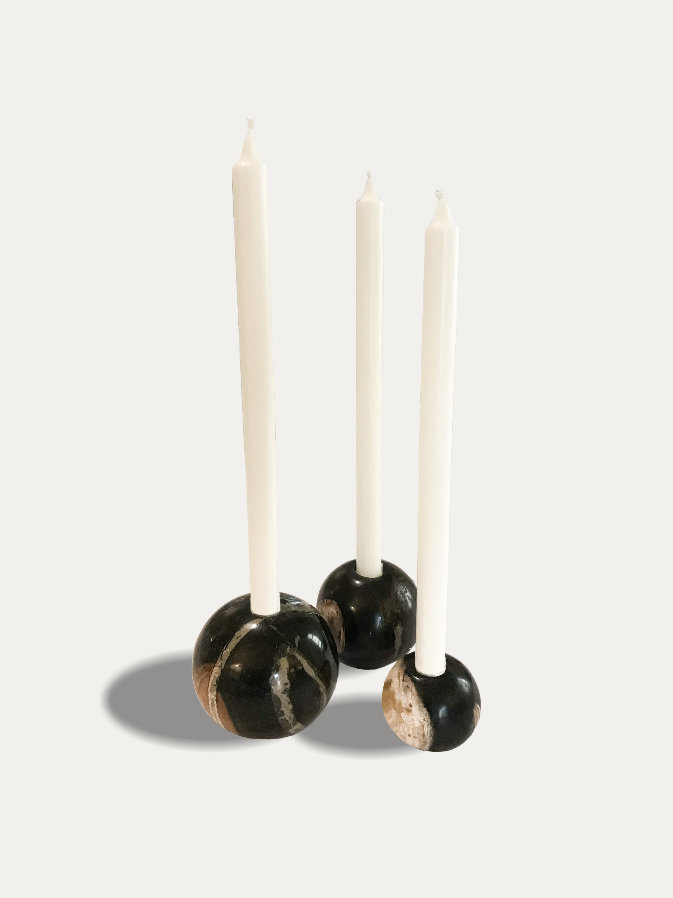 Set of 3 round reversible candle holders in petrified wood