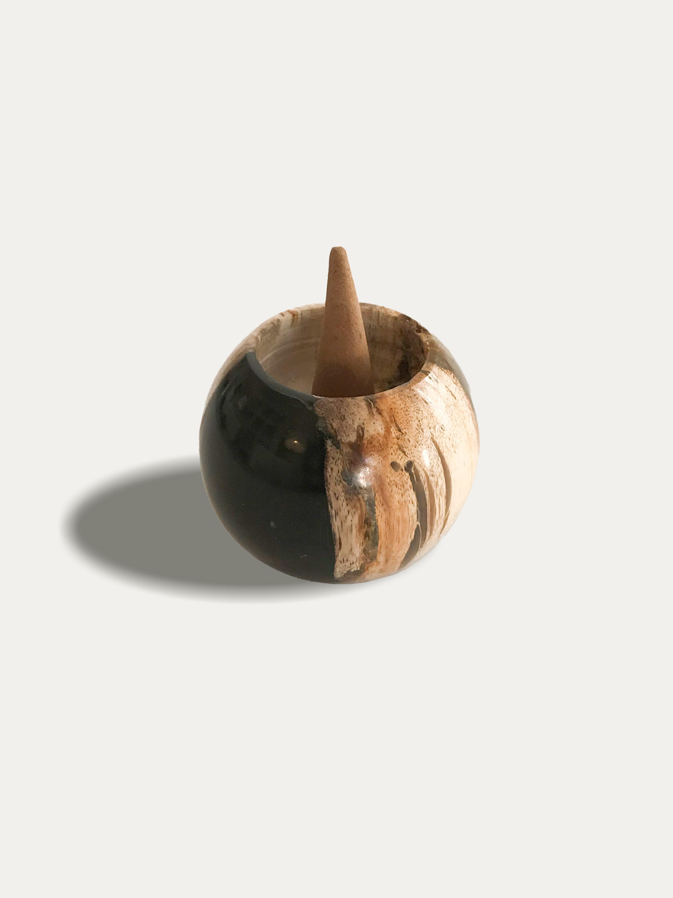 Round reversible candle/incense holder in petrified wood and assorted Balinese incense