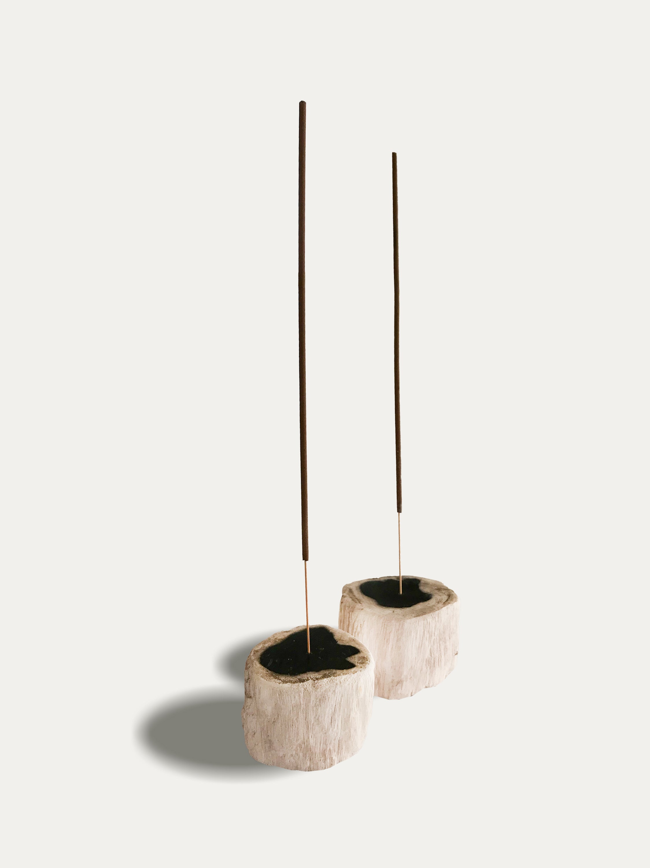 Set of 2 organic reversible candle/incense holders in petrified wood and assorted balinese incense