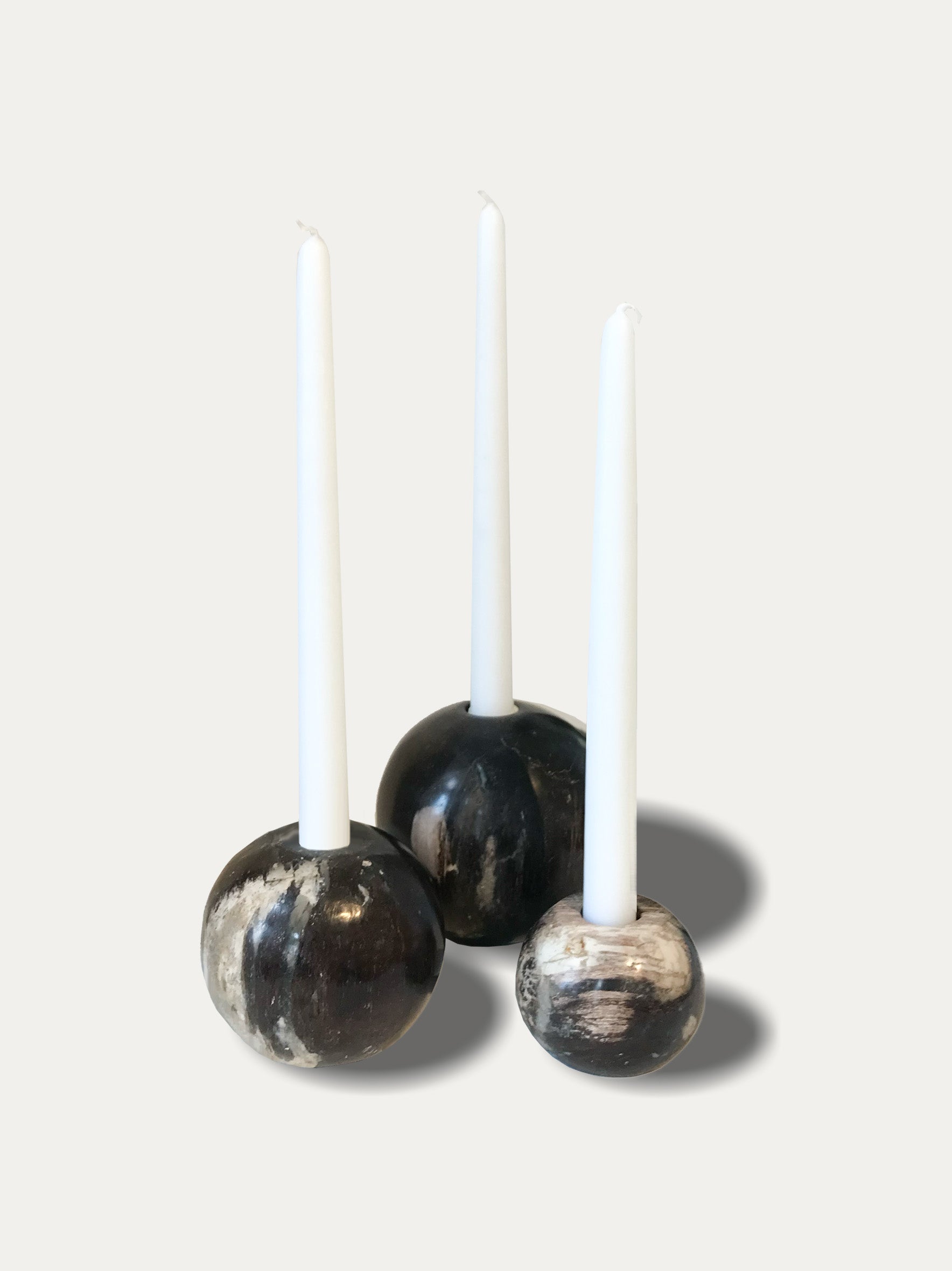 Set of 3 round reversible candle holders in petrified wood