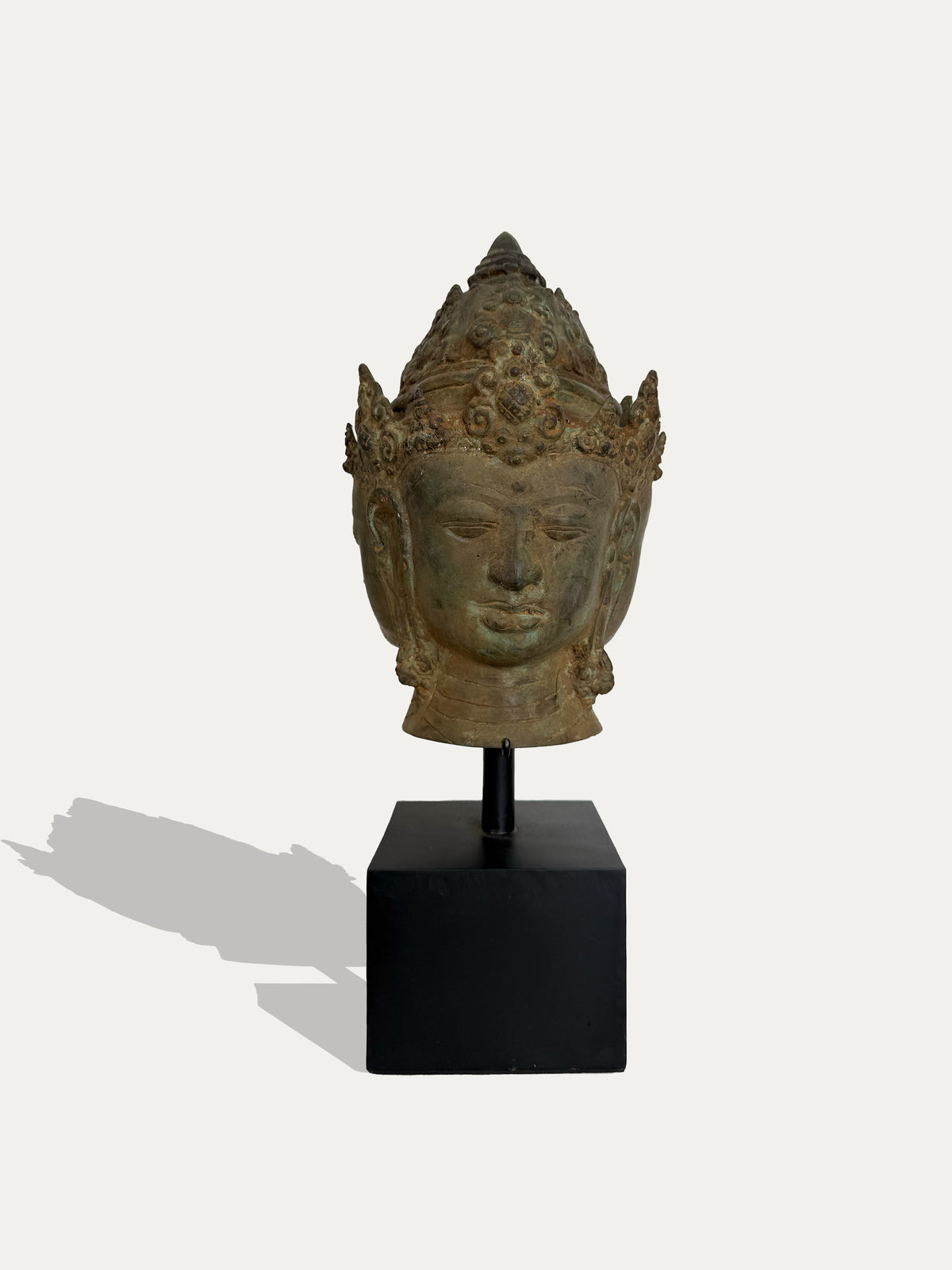 Antique Majapahit-style bronze multi-faced head from Java, Indonesia