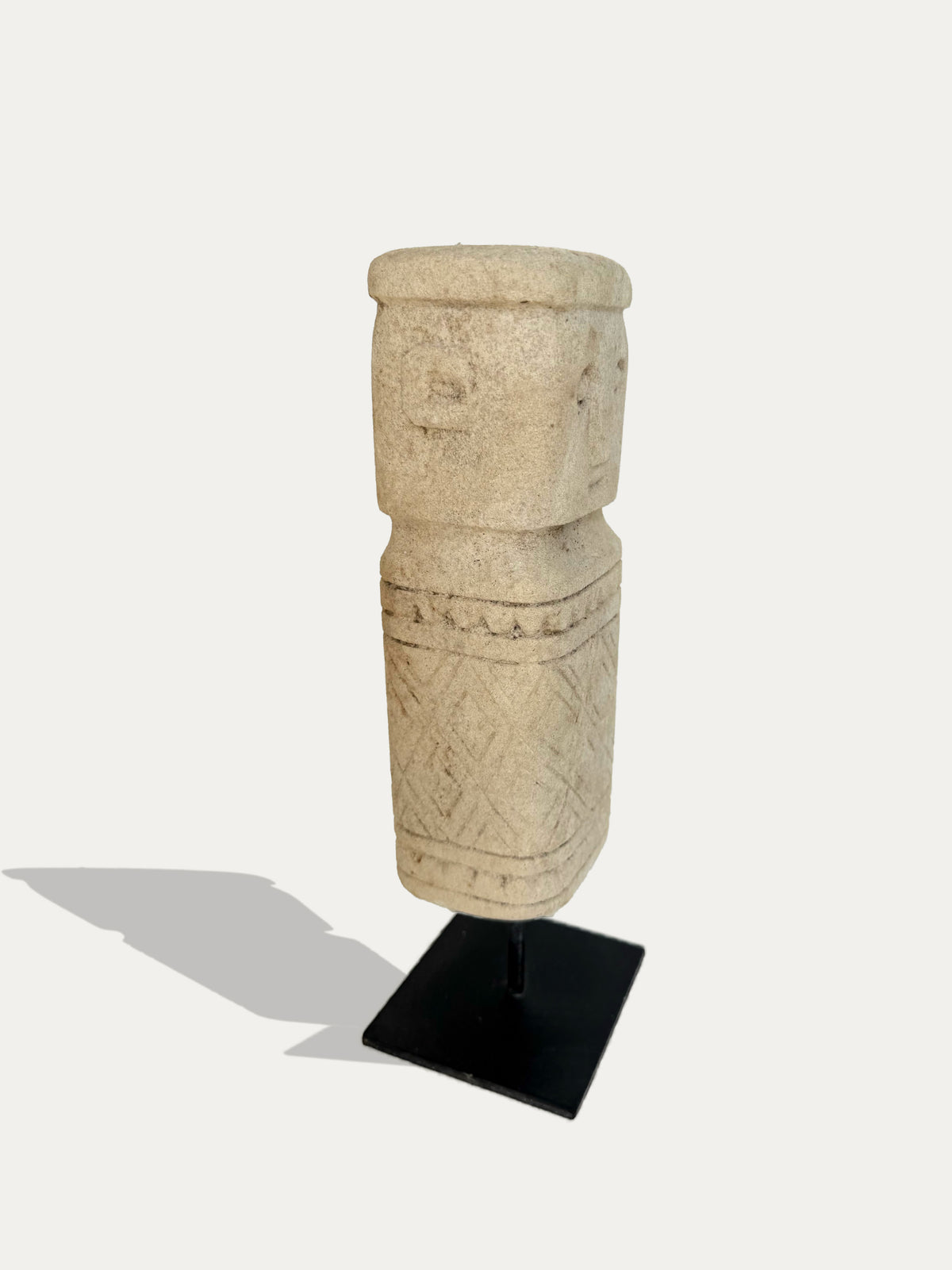 Timor limestone tribal statue hand-carved in Indonesia with ancestral figure