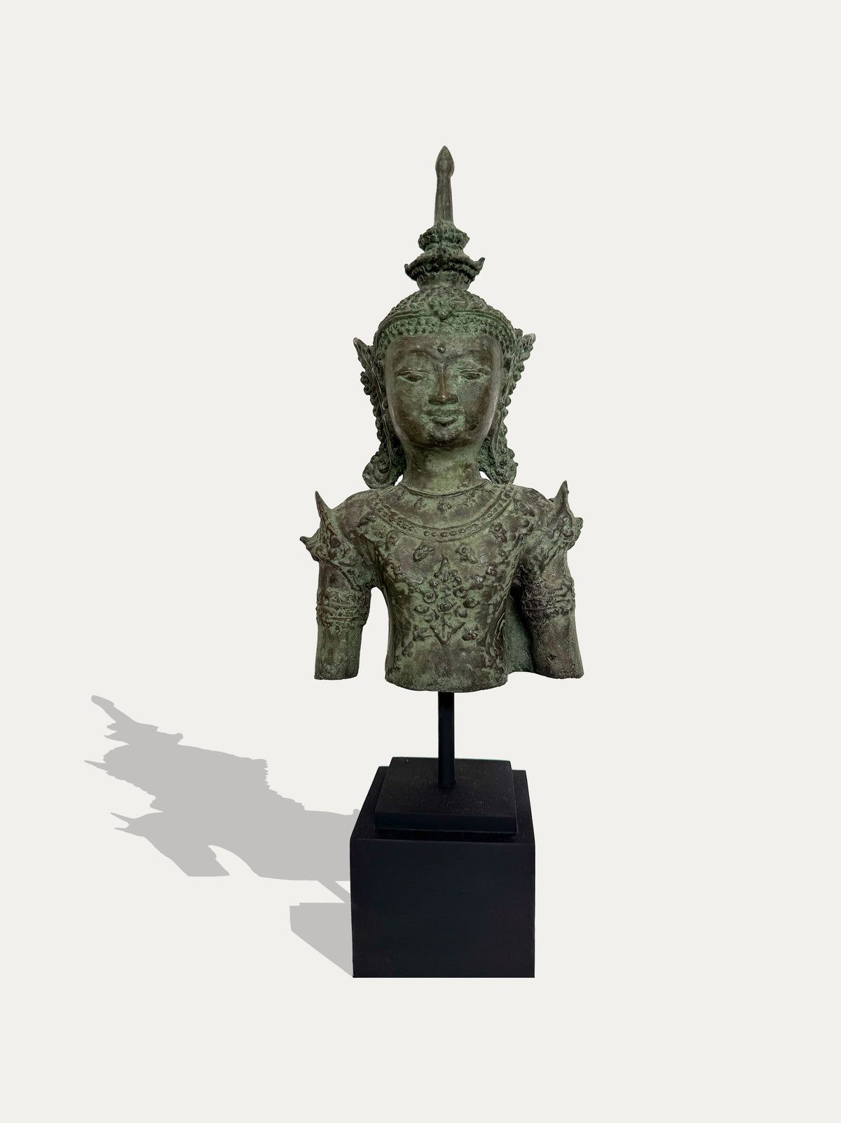 Vintage Thai bronze crowned deity bust inspired by sacred temple art