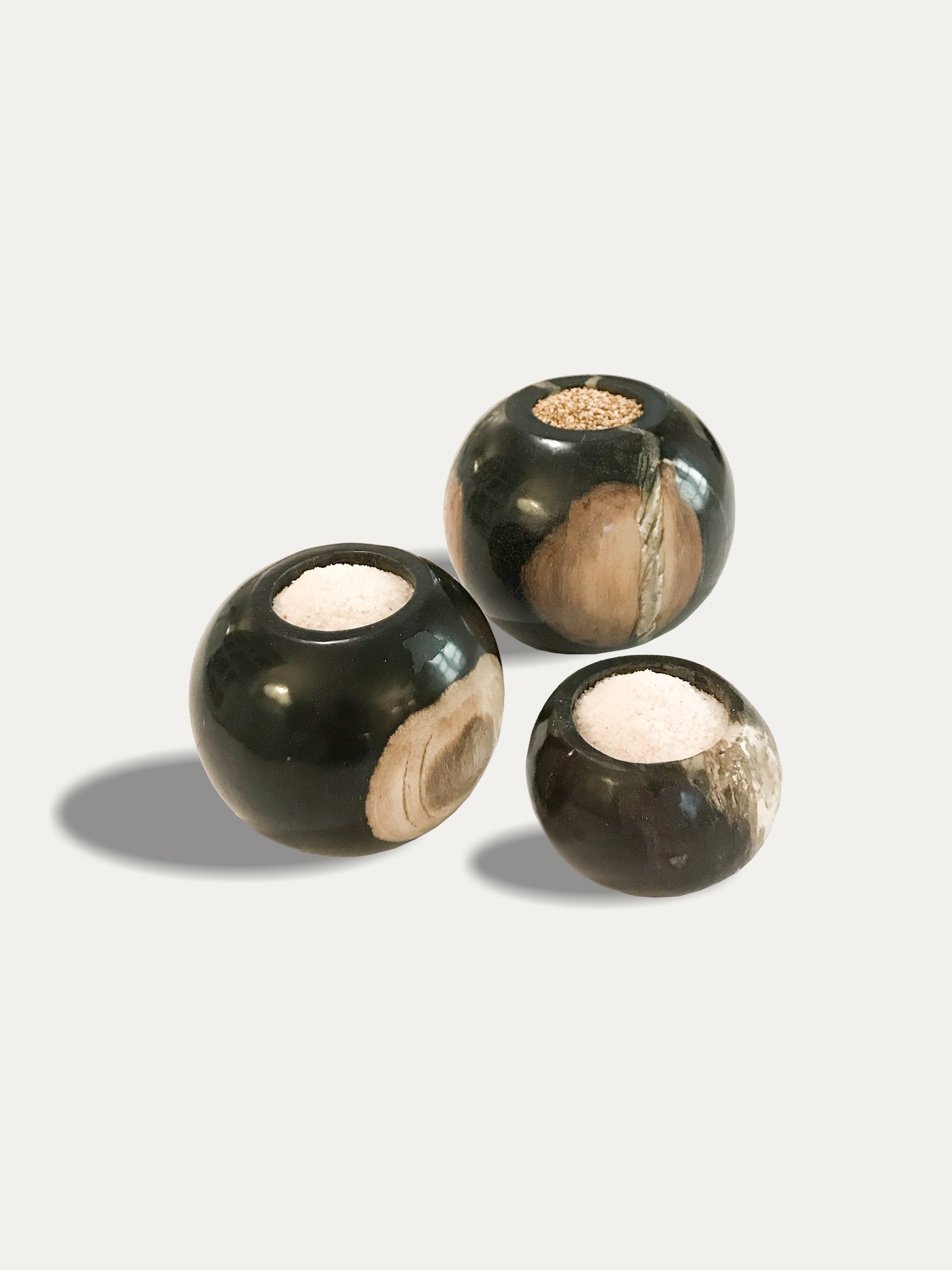 Set of 3 round reversible candle holders in petrified wood